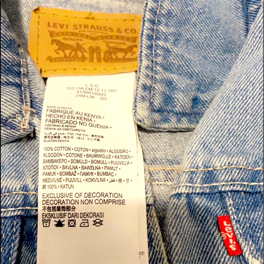 Blue denim Levi’s jacket size LG fits kinda like a medium though